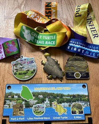💪 Today I completed a running goal that has been on my list for many years: The Mackinac Island Trio! 

🪻Lilac Run 10K
🌊 Mackinac 8-Miler
🐢 Great Turtle Trail Run (5.7 miles)

I spent a lot of time on the island this year, and it has been so fun and so meaningful. 🌸

I have done the 8-miler in the past and it’s a pretty easy and flat race. Lilac Run and Great Turtle were firsts for me and both had some serious climbing involved. 😵‍💫

Today was really challenging mentally. It was the most crowded race and super hilly, so it was hard to get into that blissful race flow. I also just had life on my mind. However, I’m glad I did it because I surprised myself. 

I have done a LOT of challenging races this year. A 6-hour trail run, a hilly half…and I have found that I don’t care about time but rather the mental challenge of it all. 

Going into next year, this will be more important than ever as I train for my biggest challenge yet! 😁 

#running #trailrunning #mackinacisland #runmackinac #10K #greatturtlerun #lilacrun #mackinac8miler #slowafrunclub #sisu