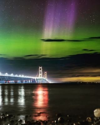 Reaching for the heavens. #PureMichigan 

📷: nat_geo_vibes 

#AuroraBorealis #aurora #NorthernLights #MackinacBridge #MightyMac #DarkSkies